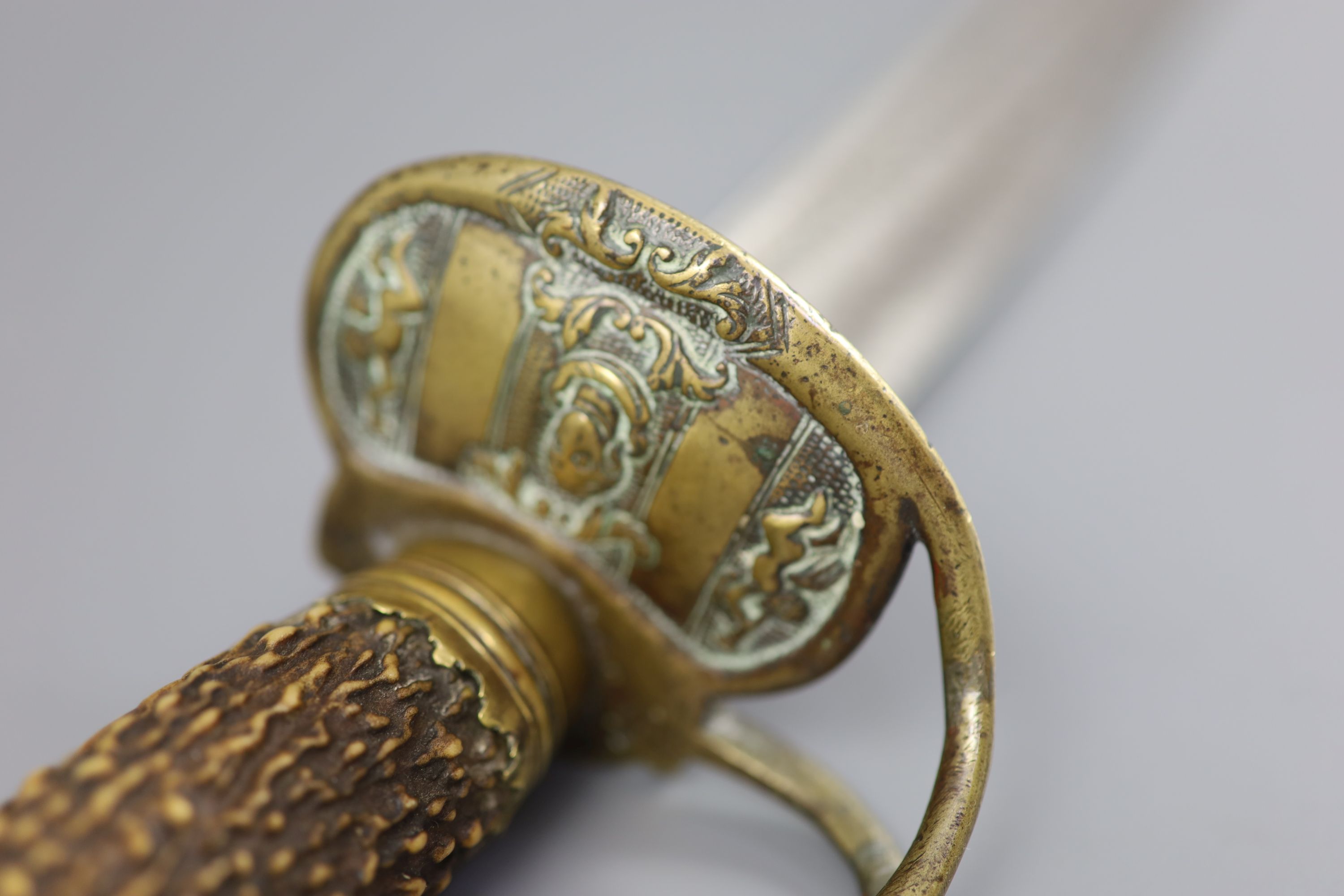 A late 17th century military hangar sword, length 34in.